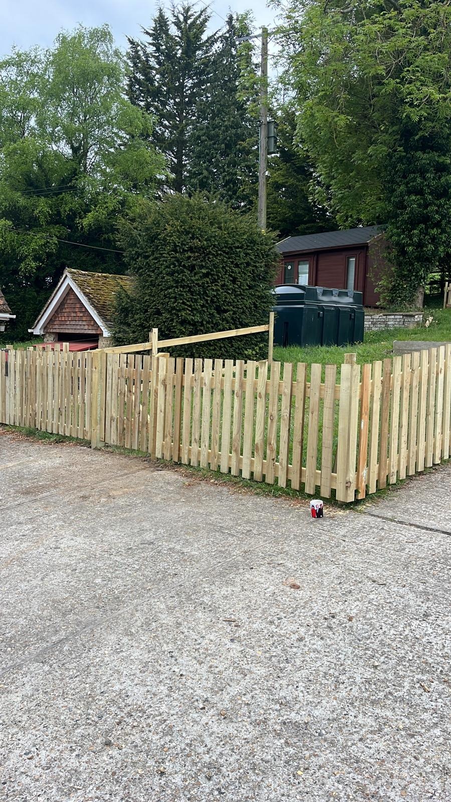 New timber picket fencing installed along a driveway boundary in Kent