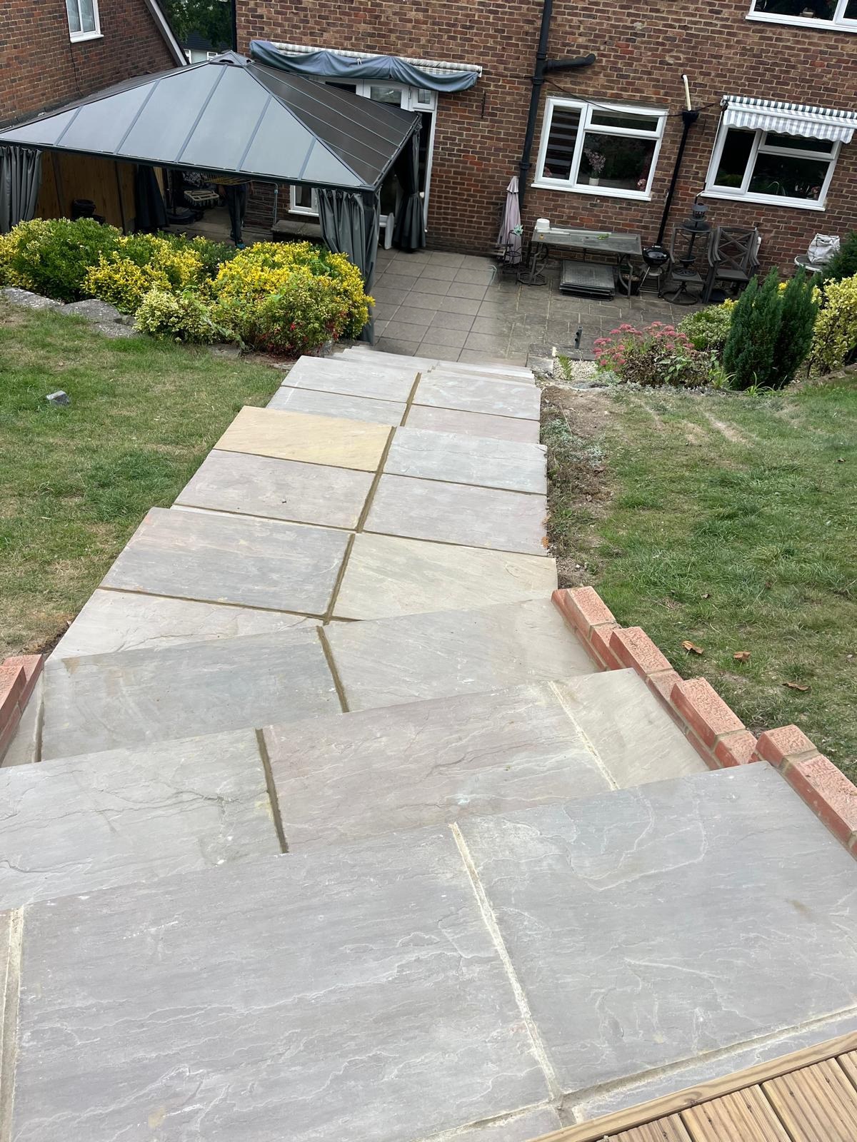 Sandstone garden steps laid down a sloping garden in Kent